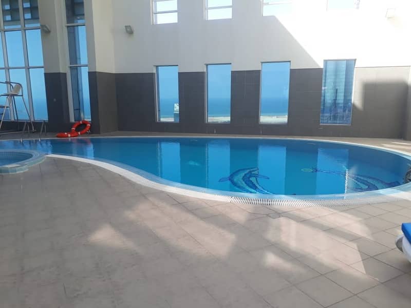 LUXURIOUS APARTMENT WITH BIG POOL AND WITH GYM FACILITY  3 HUGE BEDROOM  AND MAIDS ROOM 130,000/YEAR