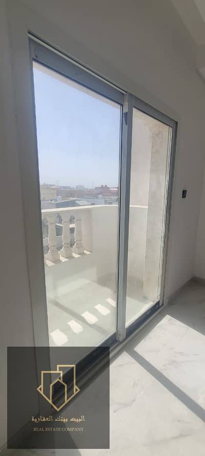 For annual rent in Ajman, a room and a hall, 2 bathrooms, in Al Mowaihat 3