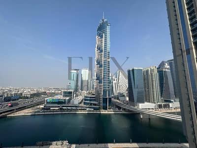 1 Bedroom Apartment for Rent in Business Bay, Dubai - Kitchen Appliances | Pool & Canal View |Prime Location