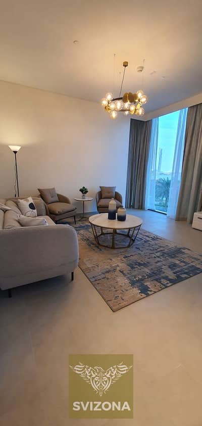 2 Bedroom Apartment for Rent in Dubai Creek Harbour, Dubai - Living room. jpeg