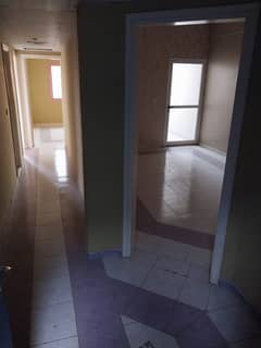 Two rooms and a hall with 2 bathrooms, 2 balconies and wall cabinets with parking, Al Jurf 1, close to Ajman Court and Ajman University. Price 32 thou