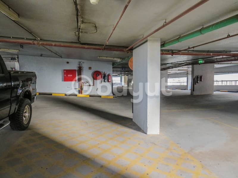 LOWER FLOOR! 2BR  w/ Balcony & Complete Amenities &  S.Zayed Road View!