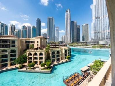 2 Bedroom Flat for Rent in Downtown Dubai, Dubai - Partial fountain & Burj Khalifa View