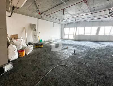 Office for Rent in Motor City, Dubai - SHELL and CORE | DUBAI AUTODROME TRACK VIEW