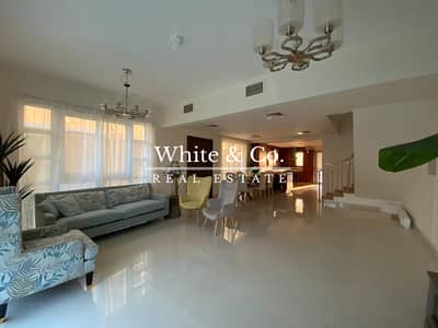 4 Bedroom Villa for Rent in Jumeirah Village Circle (JVC), Dubai - 4BR + Maid | Fully Furnished | 4 Cheques