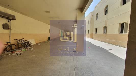 1 Bedroom Building for Sale in Industrial Area, Sharjah - URGENT SALE LABOUR CMP WITH BUILDING SHOPS 144ROOMS CMP 12 1BHK BUILDING 6S  ASKING PRICE 30 MILLION