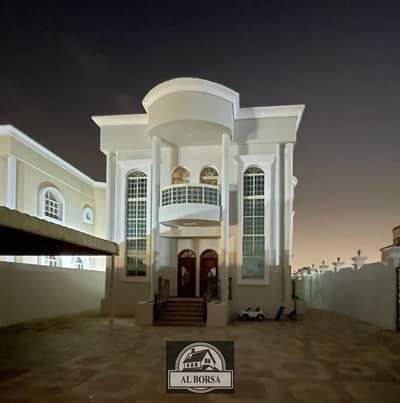 A beautiful villa for rent in Ajman, Al Rawda 2, featuring a charming view at the corner of two main streets in a very beautiful location