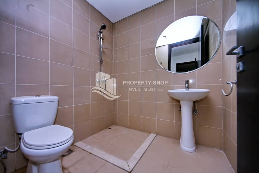 12 3-bedroom-apartment-al-reem-island-marina-square-rak-tower-maids-bathroom. JPG