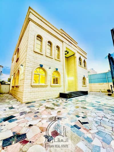 5 Bedroom Villa for Rent in Al Rawda, Ajman - For rent, a villa in Al Rawda area, consisting of 5 rooms, a sitting room, a hall, and a maid’s room