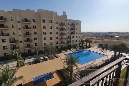 1 Bedroom Apartment for Rent in Remraam, Dubai - NEW | Pool View | 4 Cheques | Fully Fitted Kitchen