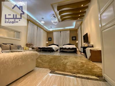 Villa for rent in Al Mowaihat area, 7 bedrooms, a board, a hall, a kitchen, a maid's room and an annex