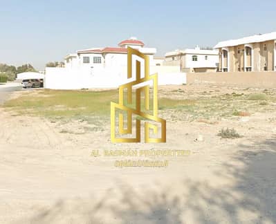 For sale, a corner residential land in Sharjah, Al Ramaqiya area, Wasit suburb