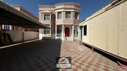 A beautiful villa for rent in Ajman, Al Rawda 3, with a charming view close to the main street, Kash, all at once
