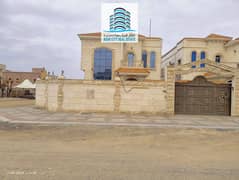 A beautiful villa for rent in Ajman Al Rawda 1 features an attractive view of two main streets in a beautiful location.