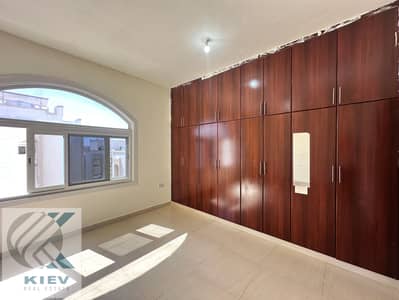 Studio for Rent in Khalifa City, Abu Dhabi - Family villa-Modern spacious studio | Built-in wardrobe | Sep. kitchen and bathroom