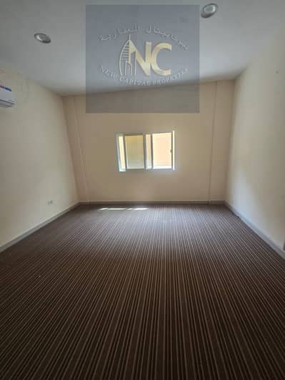 For rent in Ajman, an annual, unfurnished studio, Rawda 2 area, first resident