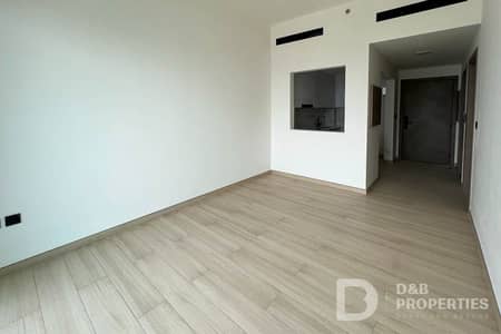 1 Bedroom Flat for Rent in Jumeirah Village Circle (JVC), Dubai - Brand New | Mid Floor | Community View