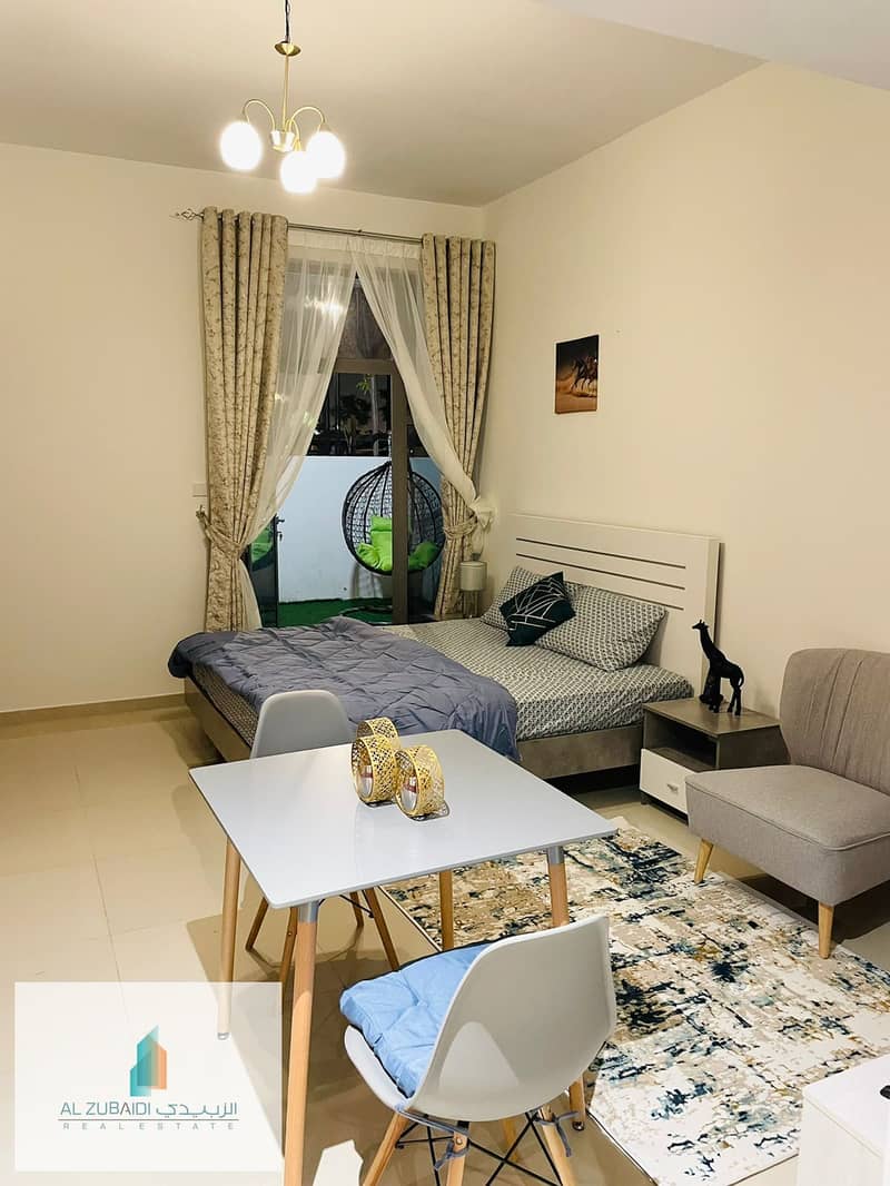 Fully furnished studio available with one parking (wifi free sewa separate) Uptown Al zahia sharjah