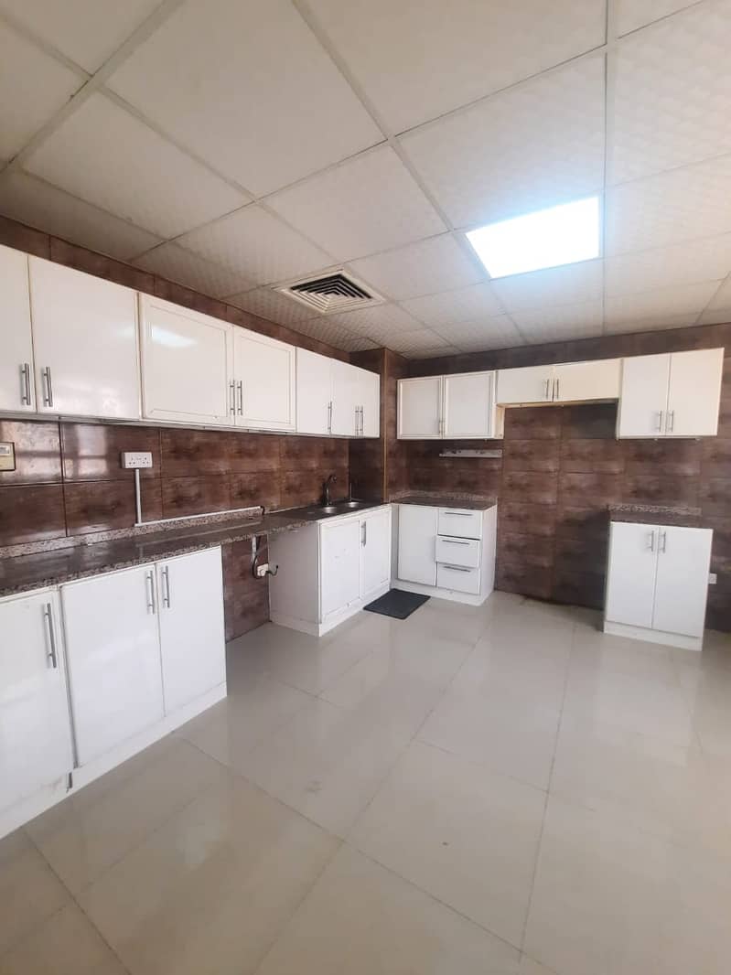 SPECIOUS TWO MASTER BEDROOMS HALL CLOSE TO EMIRATES NATIONAL SCHOOL MBZ CITY