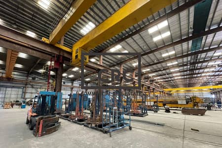 Warehouse for Rent in Jebel Ali, Dubai - Manufacturing Warehouse | Cranes | Big Plot
