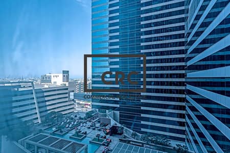Office for Rent in Sheikh Zayed Road, Dubai - Semi Fitted Office Space With Sea View