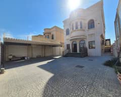 Villa for rent in Ajman, Al Rawda area 2 5 rooms, a sitting room and a hall And a maid's room With air conditioners 85 thousand required