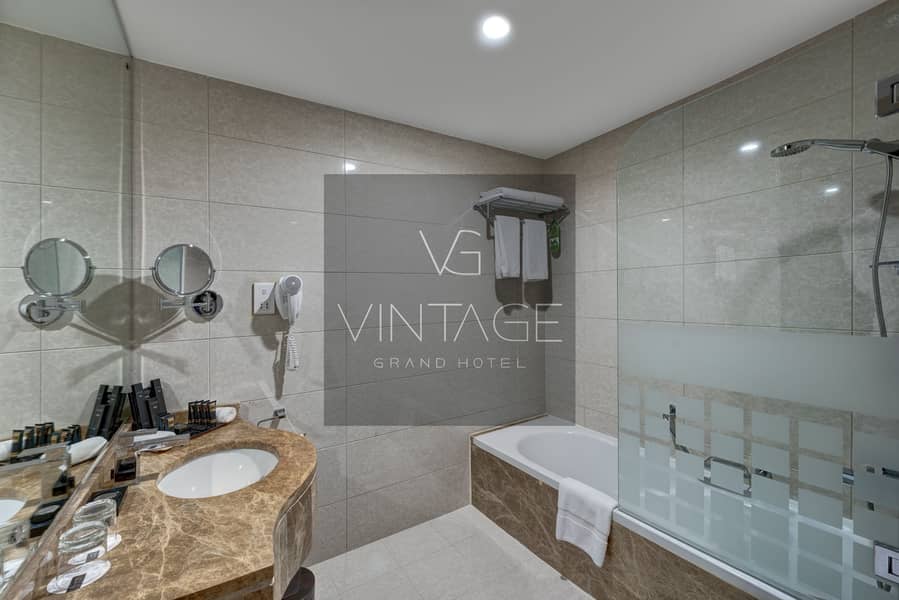 6 Ghaya Grand Hotel Dubai - Studio Bathroom 3. jpg