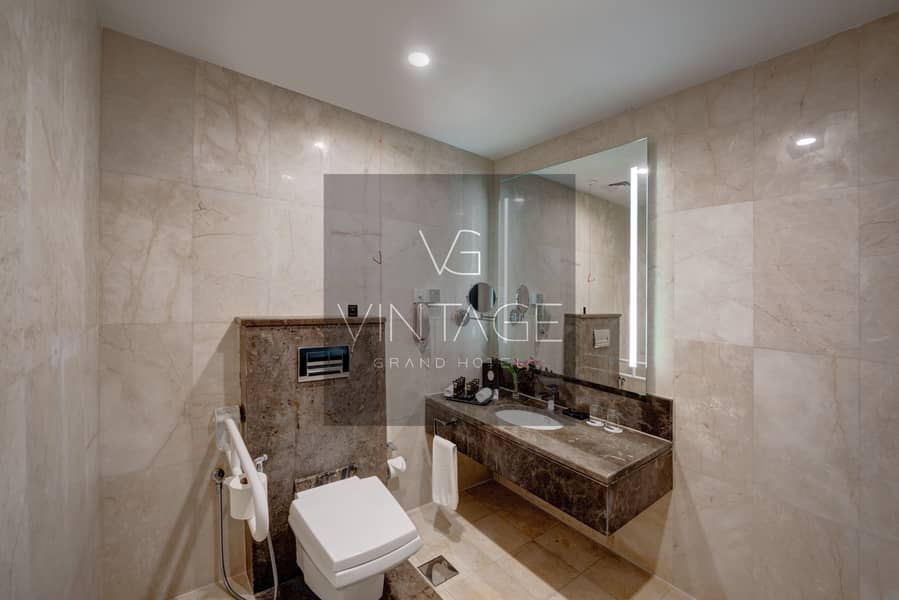 2 Ghaya Grand Hotel Dubai - One bedroom Twin Bathroom 6. jpg