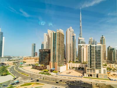 Office for Rent in Business Bay, Dubai - Furnished | Burj Khalifa View | Half Floor