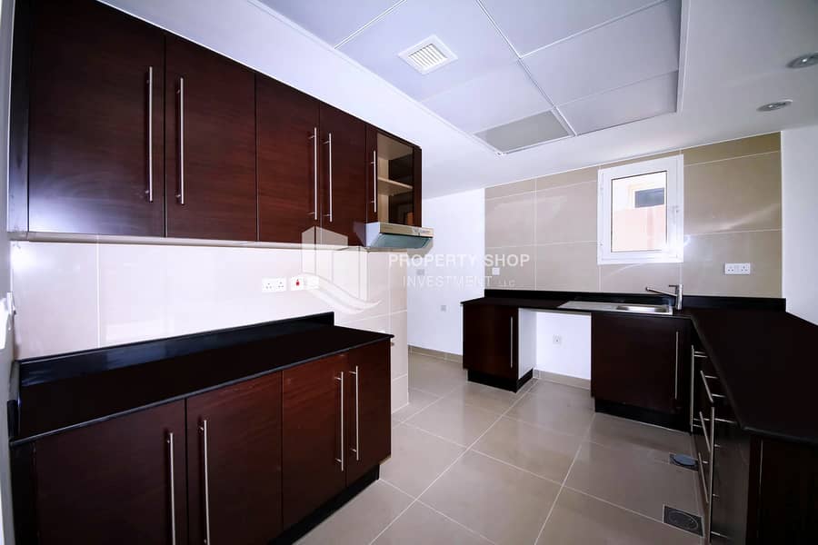 10 4-bedroom-villa-al-reef-contemporary-village-kitchen-1. JPG