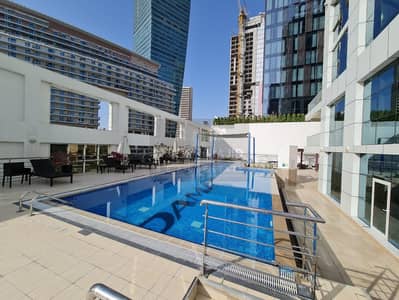 Studio for Rent in Business Bay, Dubai - swimming pool. jpg
