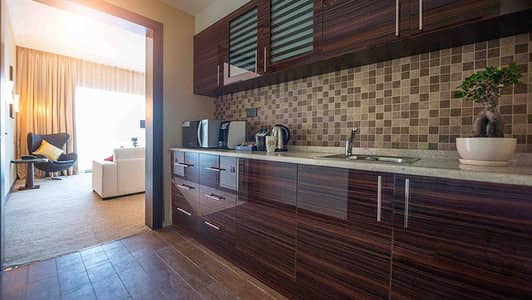 Hotel Apartment for Rent in Tourist Club Area (TCA), Abu Dhabi - Deluxe Suite Kitchenette1. jpg