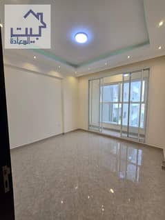 A room and a hall for annual rent in Ajman, excellent finishing a month and a free park