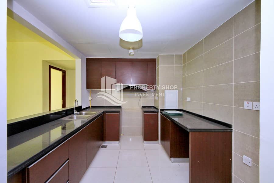 6 2-bedroom-apartment-al-reem-island-marina-square-marina-blue-kitchen. JPG