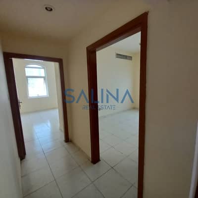 For annual rent, 3 rooms and a hall in Al Nuaimiya 2, King Faisal Street, overlooking King Faisal Street and close to all vital services and the Dubai
