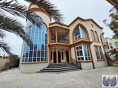 7 Bedroom Villa for Rent in Al Ramaqiya, Sharjah - Villa for rent with 7 rooms and a maid's room