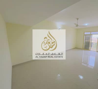 For annual rent in Ajman, exclusive offer of the week, two rooms and a hall available in Al Rawda, on Sheikh Ammar Street, 3 bathrooms, with a balcony