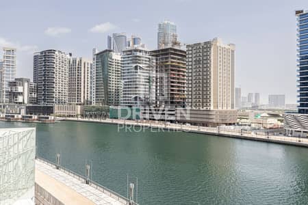 1 Bedroom Apartment for Rent in Business Bay, Dubai - Luxury | Partly Furnished with Full Canal view