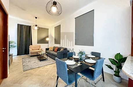 1 Bedroom Flat for Sale in Motor City, Dubai - Garden View l 1BR Corner Unit  l  Fully Furnished