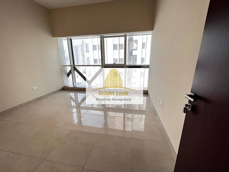 13 month !!Brand New !2 bedroom with Basement Parking + Wardrobes centralized A/C 70k located at Al Falah street