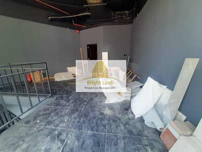 Shop for Rent in Al Nasr Street, Abu Dhabi - il8woAyCHgWNOsY7Isi3FleEOrGvu1sDEzmVB2T7