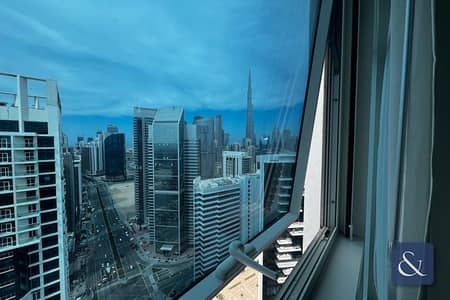 Studio for Rent in Business Bay, Dubai - Top Floor | Corner Unit | Full Burj Views