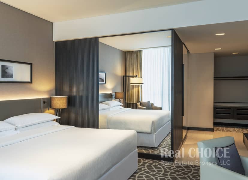 6 Sheraton Grand Hotel, Dubai - 3 Bedroom Apartment - King Bedroom. jpg