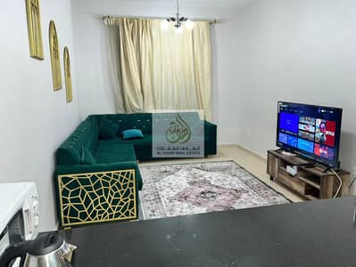 1 Bedroom Apartment for Rent in Al Nuaimiya, Ajman - Apartment for monthly rent one room, a hall and 2 bathrooms with a balcony in the city tower towers close to Safeer Mall and opposite the ruler's pala