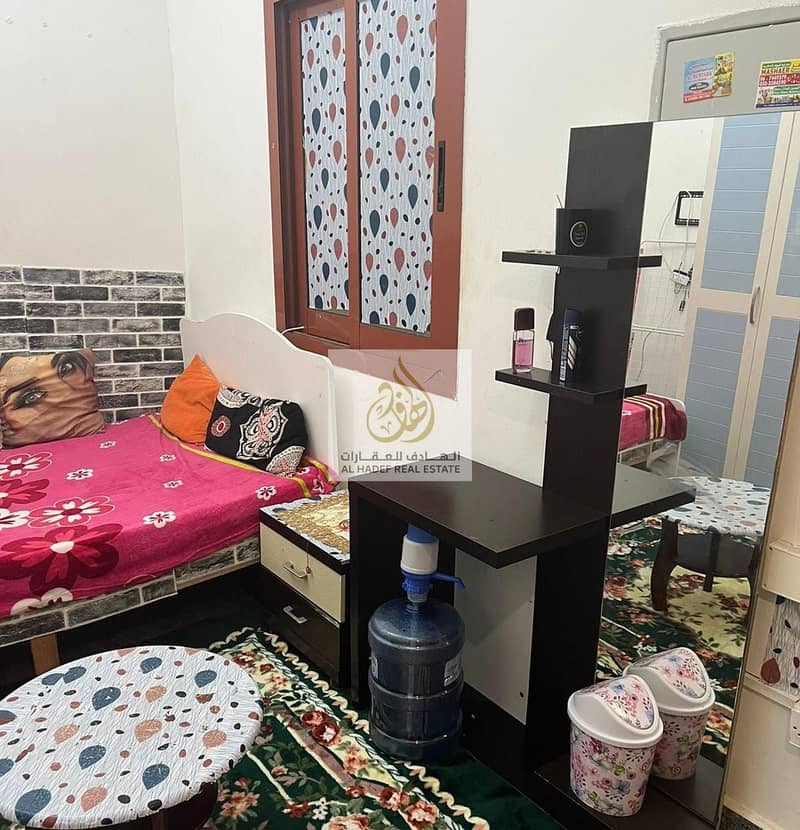 Exclusive weekly offer for furnished rent in Ajman, Al Nuaimiya, opposite Al Hikma Private School, furnished studio, very clean, including electricity