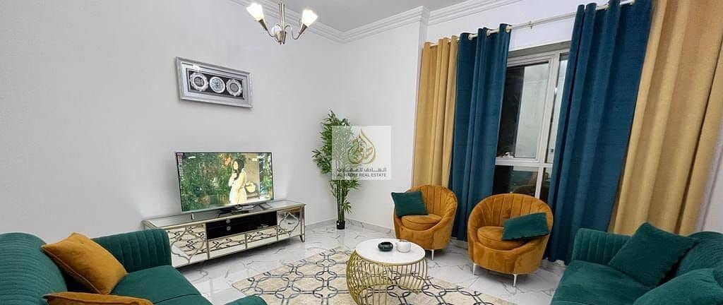 Exclusive offer of the week for furnished rent in Ajman, an apartment, a room and a hall, with 2 bathrooms, furnished, clean brushes, in the Oasis Tow
