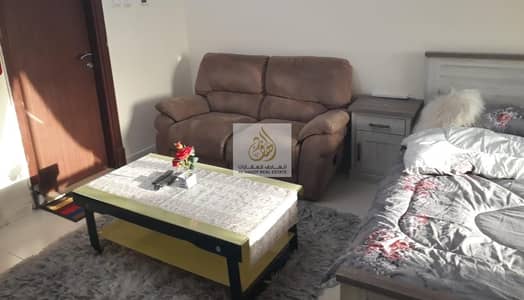 Studio for Rent in Al Bustan, Ajman - For rent in Ajman, a furnished studio for monthly rent, furnished, new furniture, in Ajman, in the Orient Towers, a large area, including electricity,