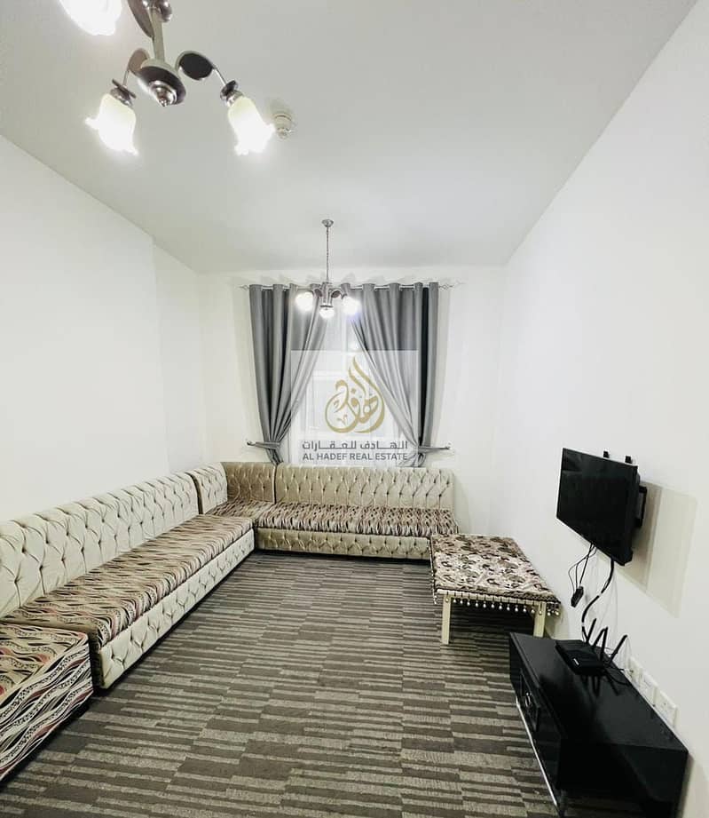 For rent in Ajman, a furnished room and hall for monthly rent, furnished with new furniture in Ajman, furnished, very clean, in the City Towers, close