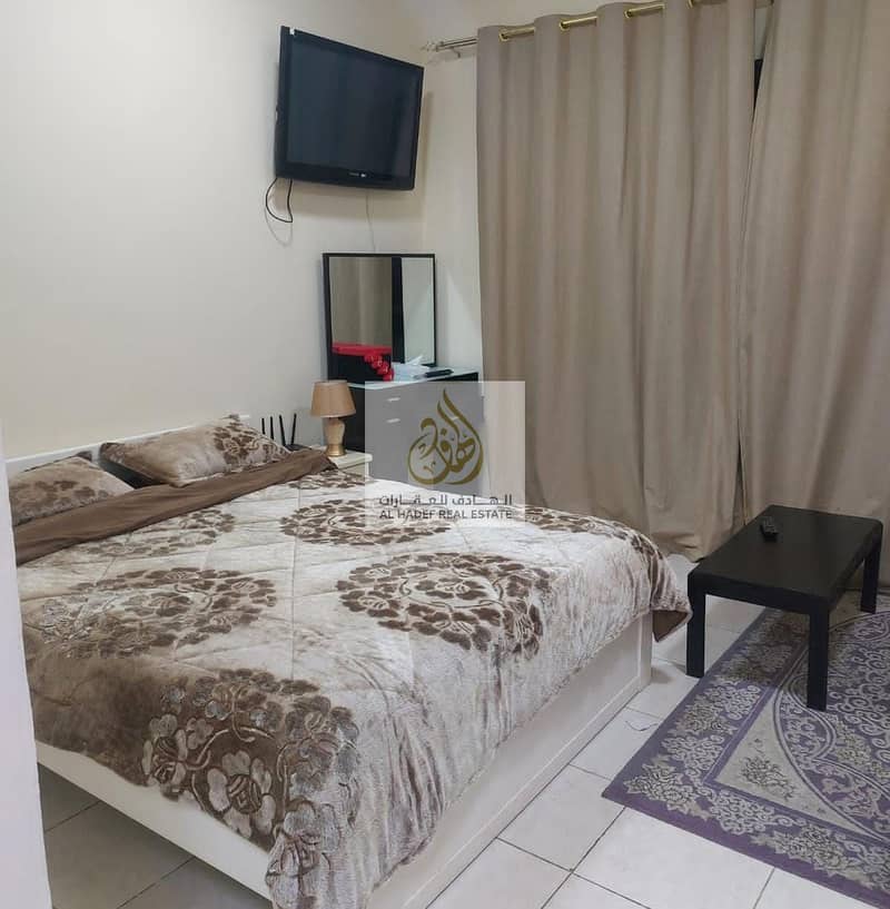 For rent in Ajman, a furnished studio for monthly rent, furnished with new furniture, in Ajman, in the Al Jurf area, in the Garden City Towers, close