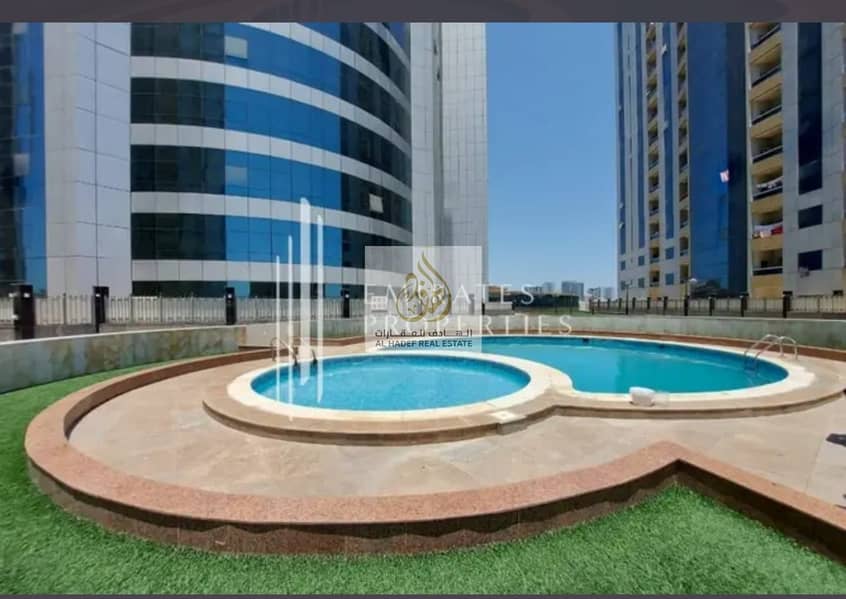 Two rooms, a living room, two bathrooms and a separate kitchen, one of the best furnished apartments in Ajman, with a very distinctive view directly o
